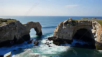 Natural stone sea arches, coastal beauty, ocean rock formations, seascape stock footage generative AI