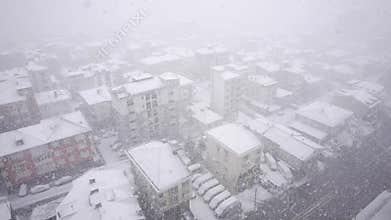 Snow covers city streets amid winter storm