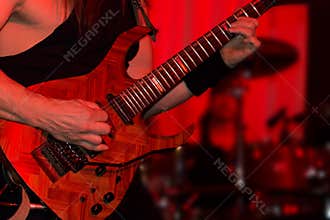 Lead guitarist playing electric guitar in a band