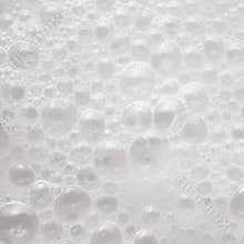 White foam with air bubbles background texture macro