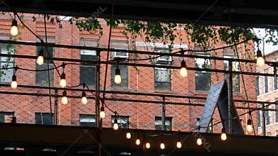 New York City building architecture, house exterior. Red brick facade. High line end, Chelsea, USA.