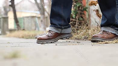 Smoker Treads over Cigarette