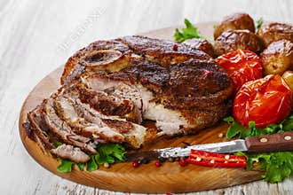 Roasted pork shoulder on the bone