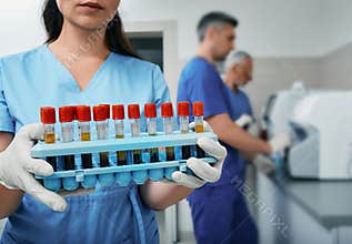 Test tube rack with blood test samples in laboratory, close-up at modern medical lab
