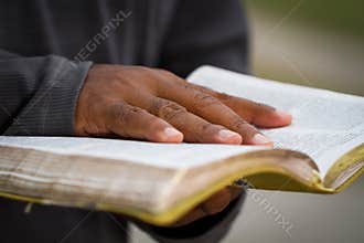 Man holding a Bible