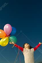 Girl and baloons
