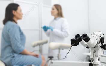 Colposcopy, examination of cervix. Colposcopy close-up over gynecological consultation of woman patient with doctor gynecologist