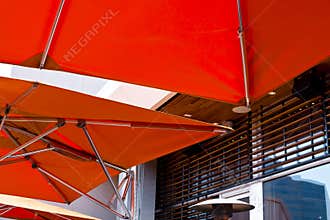 Modern bright orange awning with stainless steel tube