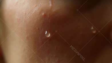 Detailed skin closeup. Photograph capturing detailed skin features under warm lighting conditions