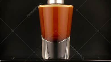 Making espresso at exclusive coffee machine