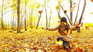 Brunette girl in autumn park