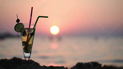 Mojito on the beach at sunset