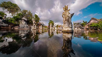 Reflective Palace Courtyard With Monumental Stone Statue