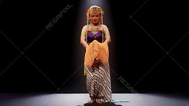 Close Portrait of Traditional Performer Holding Ceremonial Fabric
