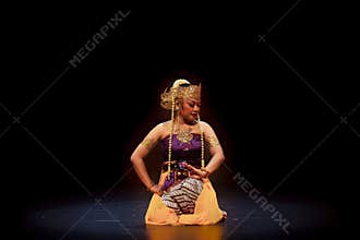Elegant Cultural Performer with Refined Hand Gesture