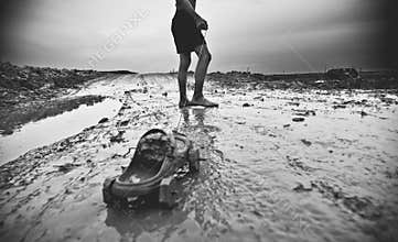 Poor kid in Cambodia who are playing on the street