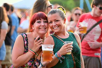 People have fun drinking beer and watching concerts at FIB Festival