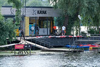 Kayak Rental Station And Paddle Board Dock On Riverside