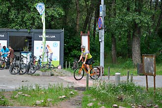 Road Cyclist Near Bicycle Rental Station In Kyiv