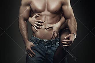 young couple body at night closeup