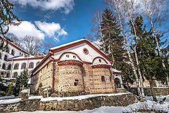 BULGARIA: Medieval stone Orthodox church under clear blue sky