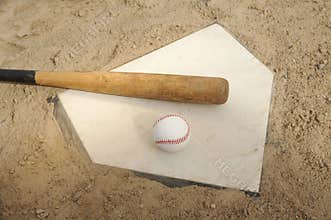 Baseball And Bat On Home Plate