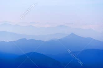 Distant mountain silhouettes