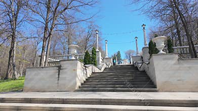 Chisinau, Moldova - April 5, 2026: Busy park walkway with families and pedestria