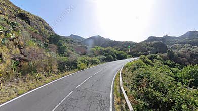 Driving on mountain serpentine road TF-12, Tenerife, Canary Islands