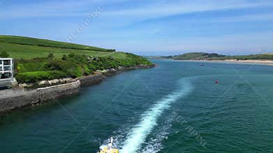 Padstow, North Cornwall, England: DRONE VIEWS: A passenger ferry heads for Padstow harbour