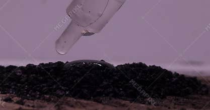 Close-up of the exothermic redox reaction between potassium permanganate and glycerin