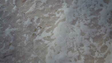 Drawing of a heart symbol on a beach