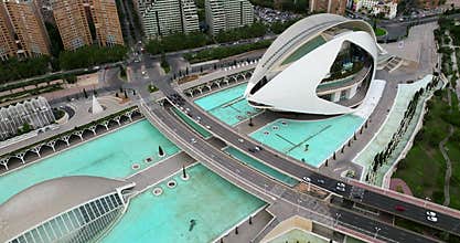Cars driving across bridge at City of Arts and Sciences in Valencia