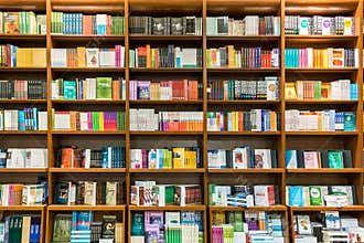 Bookshelf In Library With Books For Sale