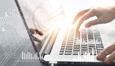 Businessman working and plan strategy of target on network network connection investment with digital icon on laptop background