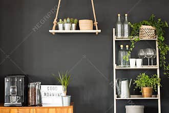 Modern kitchen with black wall