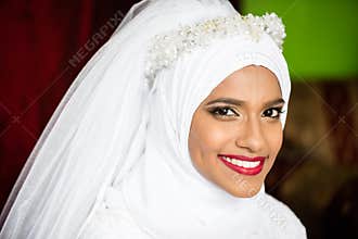 Muslim bride young beautiful beauty white wedding dress headscarf portrait smile