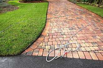 Paver driveway professionally cleaned