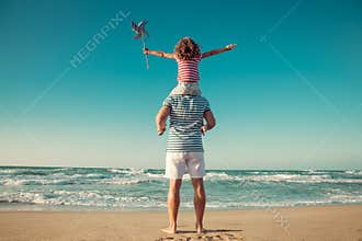 Happy family having fun on summer vacation