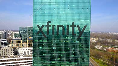 Aerial shot of office skyscraper with Xfinity logo. Modern office building. Editorial 3D rendering 4K clip