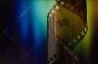Camera strip on rainbow background