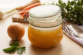 Bone broth made from chicken in a glass jar
