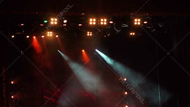 Flashing concert light in an empty theater.