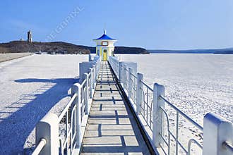 Scenery with a pier in a frozen lake, Changchun, China