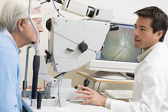 Doctor Checking Patient's Eyes For Glaucoma