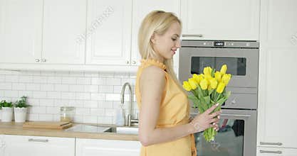 Tender female holding bouquet