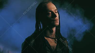 Cute male vampire with dreadlocks