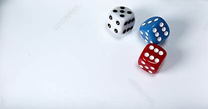 Dice rolling against white background,