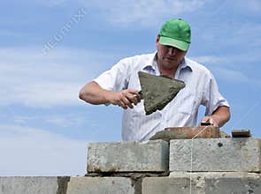 Bricklayer at work