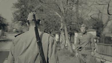The son leaves his parents' home for war, shooting